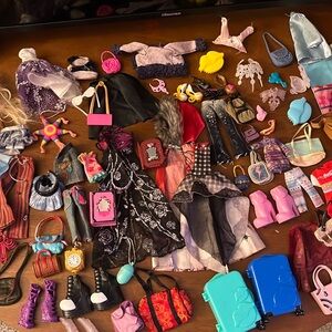 Lot of bratz vintage and newer clothes shoes shirts accessories for sale!!!